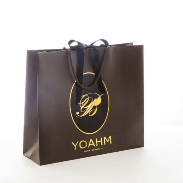 un sac papier personnalisé pour la boutique Yoahm